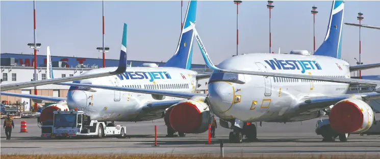  ?? GAVIN YOUNG / POSTMEDIA NEWS FILES ?? More than 4,500 employees have left Westjet since the pandemic began and another 5,100 workers are inactive, leaving about 4,900 on active duty, Chris Varcoe writes.