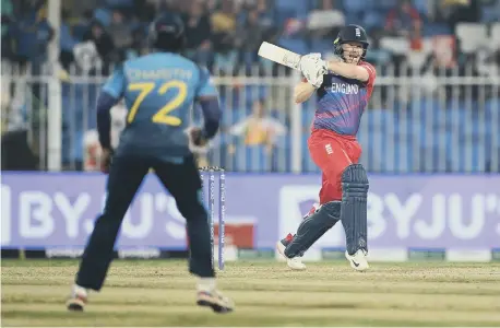  ?? ?? England’s Eoin Morgan plays a shot during the ICC Men's T20 World Cup match against Sri Lanka at Sharjah Cricket Stadium.