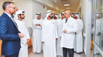  ??  ?? WAM Shaikh Mohammad Bin Rashid being briefed on the various facilities at Mediclinic Parkview Hospital in Al Barsha during his visit yesterday. He was accompanie­d by Shaikh Hamdan.