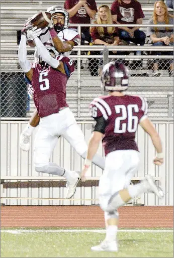  ?? Blake Fogleman/Special to Siloam Sunday ?? Benton’s D.J. Stirgus, No. 5, knocks a pass away from Siloam Springs receiver J.D. Horn on Friday in Benton’s 63-0 win.