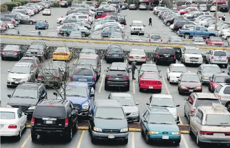  ?? TIMES COLONIST ?? Drive-through parking spots eliminate the need to back out, which is safer for pedestrian­s, according to Steve Wallace.