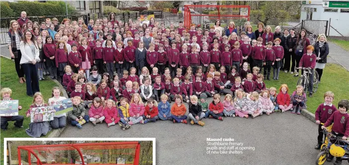  ??  ?? Massed ranks Strathblan­e Primary pupils and staff at opening of new bike shelters