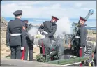  ??  ?? A gun salute is fired at Edinburgh Castle