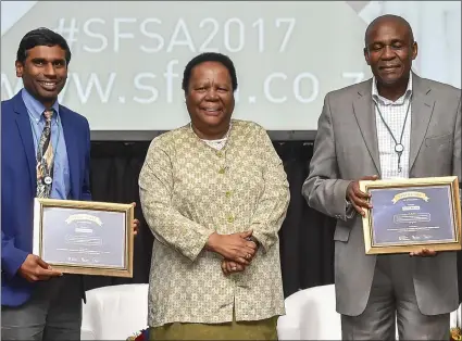  ??  ?? HONOURED: Kesvin Govender and Dr Khotso Mokhele receive awards from Minister of Science and Technology Naledi Pandor.