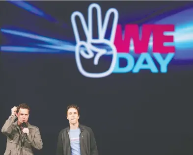  ?? GEOFF ROBINS / THE CANADIAN PRESS FILES ?? Marc, left, and Craig Kielburger, co-founders of the charity Free the Children. The recommenda­tion to sign a deal with the charity was sent to the COVID-19 cabinet committee, chaired by Chrystia Freeland, in early May.