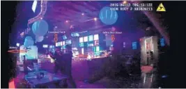  ?? PHOTOS COURTESY ORLANDO POLICE DEPARTMENT ?? Officers move toward the sound of shots being fired in Pulse.