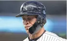  ?? BRAD PENNER/USA TODAY ?? Giancarlo Stanton started wearing a C-Flap on his helmet after he was hit in the jaw in 2014.