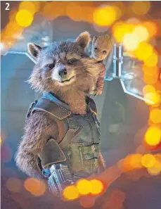  ?? FOTO: MARVEL STUDIOS ?? Waschbär Rocket (Mitte) und Baby Groot (dahinter) kämpfen auch im zweiten Teil von „Guardians of the Galaxy“gegen Feinde wie Ayesha und Nebula.