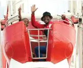  ?? ?? Tshedza Motloutsi and Percy Motloutsi enjoy the Ferris wheel.