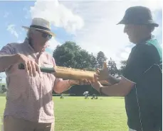  ??  ?? Larry White presents winners trophy to Howard Pedersen.