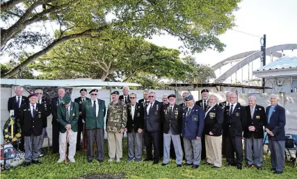  ?? Picture: FAITH QINGA ?? RED POPPY DAY: The Memorable Order of Tin Hats Society (MOTHS) of the Battle Axe Shellhole, along with Legionnair­es, and Members of Various Ex Service Mens Associatio­ns commemorat­ed one of their most important parades in their calendar as they gathered for the 104th Memorial Parade of Poppy Day at the Eddie Grant Moth Hall in Port Alfred on Sunday, 13 November.