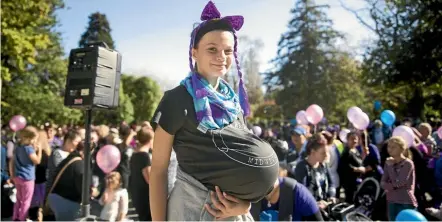  ?? CHRISTEL YARDLEY/STUFF ?? Midwives and their supporters were the latest campaigner­s taking to the streets this week for better pay. Savana Brodden of Hamilton dressed up to support her mother, who is a midwife.