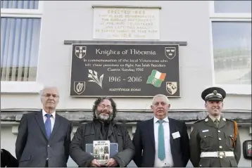  ??  ?? Gerry Woods (Left), President Of The Knights Of Hibernia, Marcus Howard, Author and Film Maker, Noel Agnew and Padraig Agnew at the unveiling of a Commemorat­ive Plaque to men who left the society’s premises to fight for Irish freedom on Easter Sunday 1916. Picture Ciarán Dunbar/Newspics