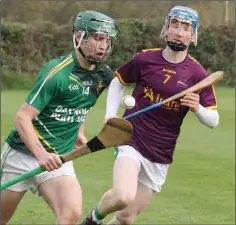  ??  ?? Enniscorth­y’s Fionn Walsh is closed down by Conor Jones (Gorey C.S.).