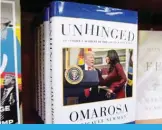  ?? — AFP ?? WASHINGTON: “Unhinged”, the new tell-all book by former White House aide Omarosa Manigault Newman, is for sale at the Politics and Prose bookstore yesterday.