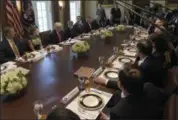  ?? SUSAN WALSH — THE ASSOCIATED PRESS ?? President Donald Trump speaks before having lunch with Republican Senators and White House staffers in the Cabinet Room of the White House Tuesday.