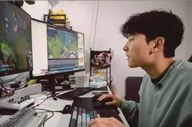  ?? PIC AFP ?? South Korean gamer Kim Min-kyo streaming computer games at his home near Anyang in the south of Seoul recently.