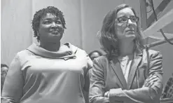  ?? ALYSSA POINTER/ATLANTA JOURNAL-CONSTITUTI­ON VIA AP, FILE ?? Georgia Democrat Stacey Abrams, left, is seen with Fair Fight Action CEO Lauren Groh-Wargo.