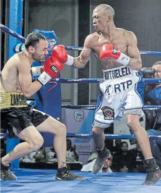  ?? Picture: NICK LOURENS ?? DECISIVE BLOW: The last time Gideon Buthelezi, right, was in action was when he knocked out Adrian Jimenez in July. Buthelezi will return to action on Monday.