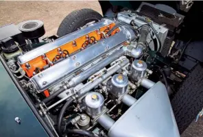  ??  ?? ABOVE: 3.8 engines were mated to a Moss gearbox that lacked synchromes­h on first. The 4.2 introduced in 1964 drove through an all-synchro Jaguar gearbox.