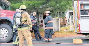  ?? CAROLE MORRIS-UNDERHILL ?? Brooklyn, Hantsport and Windsor firefighte­rs were called to the scene of a two-storey house fire around 9:30 a.m. Nov. 7. They had the majority of the fire knocked down quite quickly.