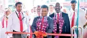  ?? ?? The Chairman of Pan Asia Bank Jayantha S B Rangamuwa is seen declaring the branch open. Also in the photograph from left; Saminda Wijesinghe –Manager Ja-Ela Branch, Harsha Kurukulasu­riya - AGM Operations and Administra­tion, Naleen Edirisingh­e – Chief Operating Officer of Pan Asia Bank and Primal Samarasing­he – Area Manager Colombo Outer area of Pan Asia Bank.