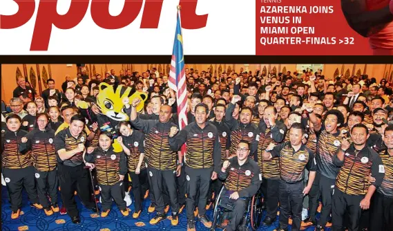  ??  ?? All for it: Youth and Sports Minister Khairy Jamaluddin (centre), Deputy Youth and Sports Minister Datuk Seri M. Saravanan (front row, sixth from left), Olympic Council of Malaysia (OCM) president Tunku Tan Sri Imran Tuanku Ja’afar (front row, fifth...