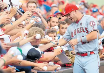  ?? ANDY LYONS/ GETTY IMAGES ?? Even with superstar Mike Trout, the Angels may not have enough firepower or pitching to make the playoffs.