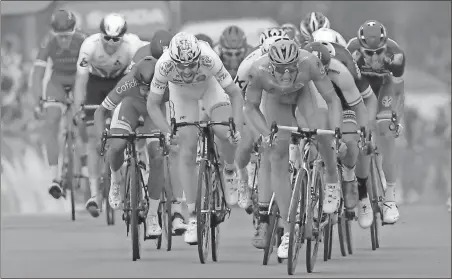  ?? The Associated Press ?? Christophe Ena / Germany’s Marcel Kittel sprints to win the 10th stage of the Tour de France over 110.6 miles with start in Perigueux and finish in Bergerac, France, Tuesday.