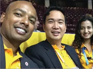  ?? PHOTO COURTESY OF MCMASTER UNIVERSITY ?? McMaster professor Dr. Kien Trinh, centre, with Dr. Shirdi Nulliah of Boxing Alberta, left, and Dr. Sam Adiga of Ontario Boxing, right, are ringside at the 2015 Pan Am Games in Toronto.