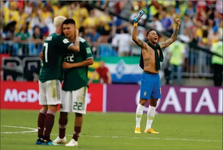  ?? ASSOCIATED PRESS ?? BRAZIL’S NEYMAR CELEBRATES as Mexico’s Miguel Layun and teammates Hirving Lozano embrace at the end of their round of 16 match at the World Cup in the Samara Arena, in Samara, Russia, Monday. Brazil won 2-0.