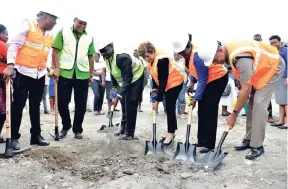  ??  ?? National Security Minister Robert Montague (third left) breaks ground for the constructi­on of a new police station in Port Maria, St Mary, on Wednesday. Others (from left) are Dr Morais Guy, member of parliament for Central St Mary; Councillor Richard...