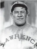  ?? Associated Press file photo ?? ■ Jim Thorpe poses in a baseball uniform in this undated file photo. Thorpe was on top of the world after winning gold medals in the decathlon and pentathlon at the 1912 Stockholm Olympics with mind-blowing performanc­es that went unmatched for decades. They so impressed the King of Sweden that he told Thorpe he was “the greatest athlete in the world.” The Native American was later stripped of the gold medals for breaching Olympic amateurism rules in what has been described as the first major internatio­nal sports scandal.