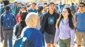  ?? U-T ?? Students walk on the UC San Diego campus in November 2019. UCSD has nearly 9,000 internatio­nal students who could have lost their visas under a federal plan rescinded Tuesday.