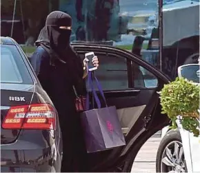  ?? AFP PIC ?? Carmakers may need to boost inventory of smaller models such as compacts and sedans for women drivers in Saudi Arabia after the kingdom issues an order allowing them to drive.