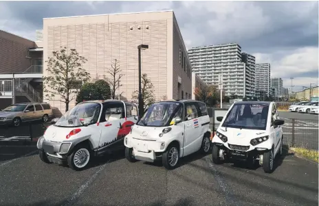  ?? Bloomberg ?? Prototypes of Fomm’s Concept One electric car parked at the company’s workshop in Kawasaki