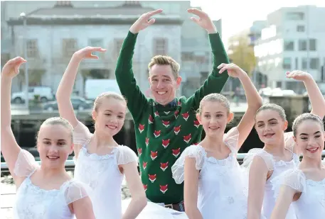  ??  ?? Ryan Tubridy with students from the Denise Moriarty School of Dance in Cork at the launch of ‘The Late Late Toy Show’ audition tour in Cork city. Photo: Daragh McSweeney/Provision