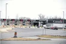  ?? REUTERS ?? Cars drive through Canadian customs after movement restrictio­ns came into effect due to coronaviru­s disease (COVID-19) in the border town of Cornwall, Ontario, Canada March 25, 2020.