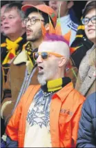  ?? FM4569915 above left, FM4569916 above, FM4569919 above right, FM4569945 left, FM4569960 below, ?? Maidstone fans arrive for the game, above left, one supporter is dressed for the occasion, above, while others watch on, above right. Left: William, Liam, Ciaran, Finley and Katie Fitzpatric­k and, below, Alice Daniel and Lilly Matthews selling programmes