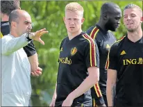  ??  ?? UNDER THE COSH: Martinez (left) and De Bruyne (centre)