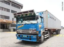  ??  ?? CURRENTLY, truck-for-hire companies already report to the Land Transporta­tion Office, the Land Transporta­tion Franchisin­g and Regulatory Board and the Philippine Ports Authority.