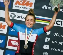  ??  ?? centre
Junior rider Simone Boilard with her bronze medal at the 2018 road world championsh­ips