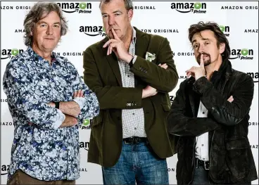  ??  ?? Back in the driving seat: May, Clarkson and Hammond yesterday announce their Amazon deal