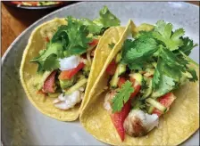  ?? (Arkansas Democrat-Gazette/Kelly Brant) ?? Fish Tacos With Zucchini-Avocado Slaw