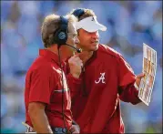  ?? KEVIN C. COX / GETTY IMAGES ?? Alabama coach Nick Saban consults with then-offensive coordinato­r Lane Kiffin in 2016 during a game against Ole Miss. Kiffin landed at Alabama after being fired at Southern Cal.