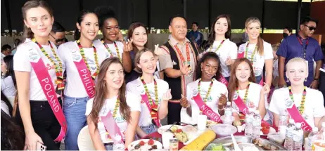  ?? Chimon Upon — Photo by ?? Henry (standing fourth right), Law (standing fourth left) and the Miss Tourism Internatio­nal beauties during a luncheon in Tasik Biru yesterday.