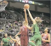  ?? TIMOTHY J. GONZALEZ – THE ASSOCIATED PRESS ?? Oregon’s Sabrina Ionescu, right, a former Miramonte High star, takes a shot over Oklahoma’s Gileysa Penzo during a Phil Knight Invitation­al tournament game on Saturday.