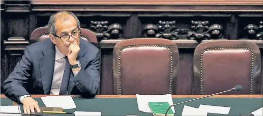  ?? [ Reuters ] ?? Tria allein zu Haus: Der italienisc­he Finanzmini­ster ist ein einsamer Kämpfer gegen budgetäre Unvernunft.