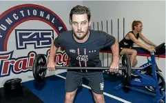  ?? PHOTO: CHRIS SKELTON/STUFF ?? New Zealand cricketer Mitchell McClenagha­n at the new F45 gym he’s opening in Howick.