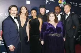  ?? PHOTO BY RICH FURY/INVISION/THE ASSOCIATED PRESS ?? Members of the cast of “This Is Us” are, from left, Milo Ventimigli­a, Mandy Moore, Susan Kelechi Watson, Chris Sullivan, Chrissy Metz, Sterling K. Brown and Justin Hartley.